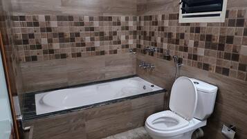 Executive Room, Multiple Beds | Bathroom | Shower, rainfall showerhead, hair dryer, soap