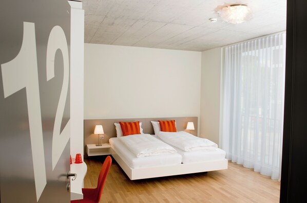 Standard Triple Room | Hypo-allergenic bedding, desk, laptop workspace, blackout drapes