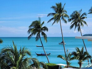 On the beach, sun-loungers, beach towels