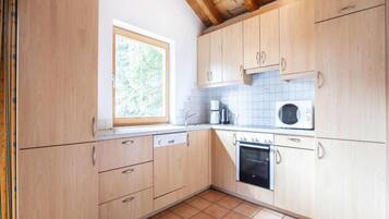 Chalet | Private kitchen | Electric kettle, toaster, highchair