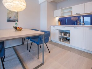 Appartement | Cuisine privée | Chaise haute