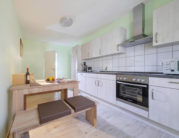 Apartamento | Cocina privada | Trona infantil