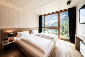 1 bedroom, bed sheets - Chalet Resort am Grossglockner With Infrared Cabin (Kals am Grossglockner)