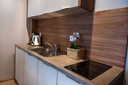 Appartement | Cuisine privée | Bouilloire électrique, chaise haute