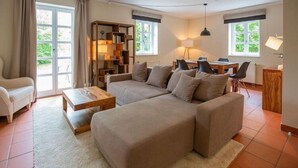 Living area - Moderne Wohnung im Rugana Feriendorf (Dranske)
