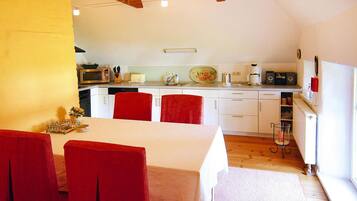 Apartment | Private kitchen | Electric kettle, toaster, high chair