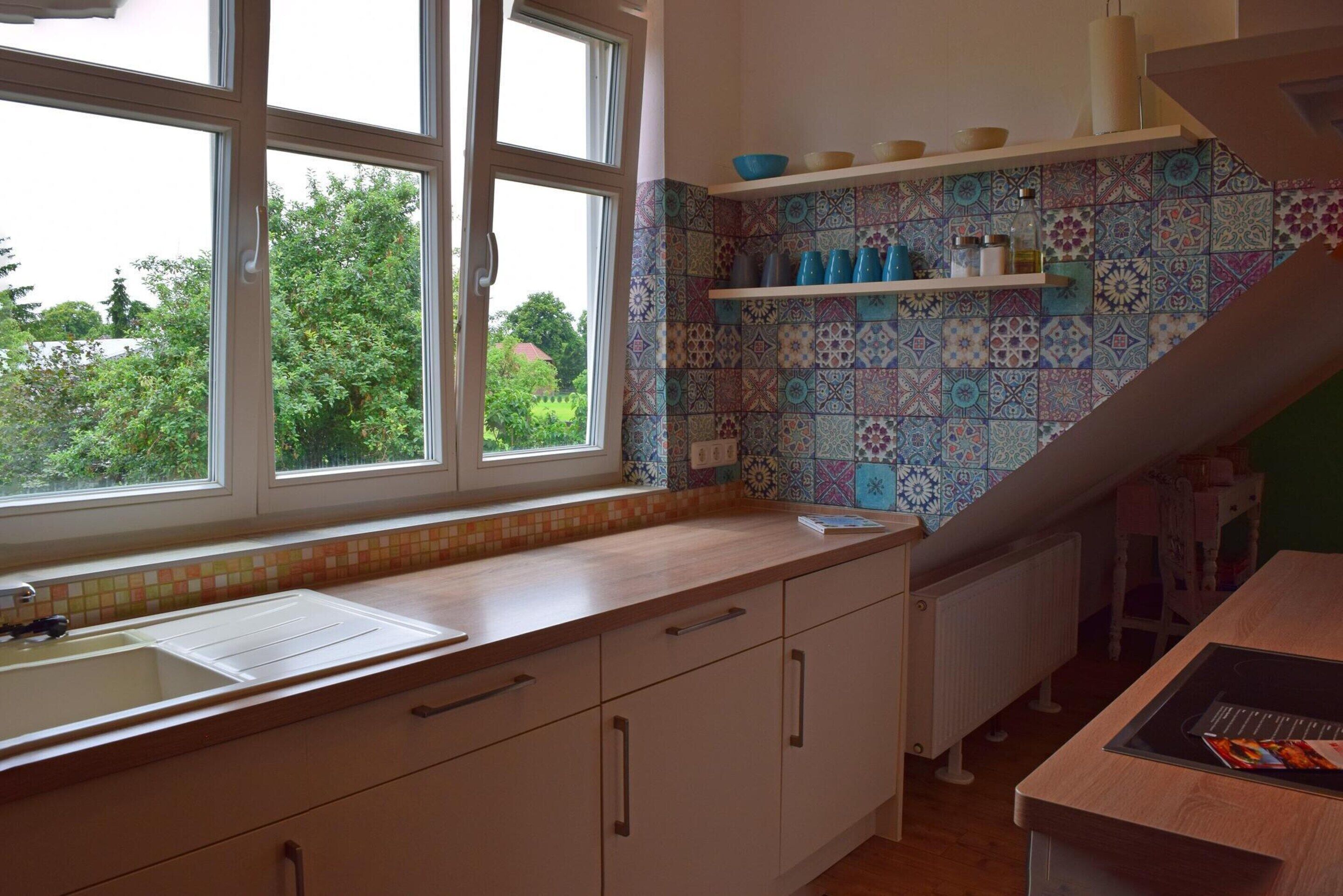 Apartment | Private kitchen | Electric kettle, toaster, high chair