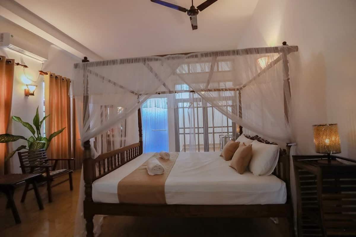 Comfort Triple Room, Balcony, Garden View | Room amenity