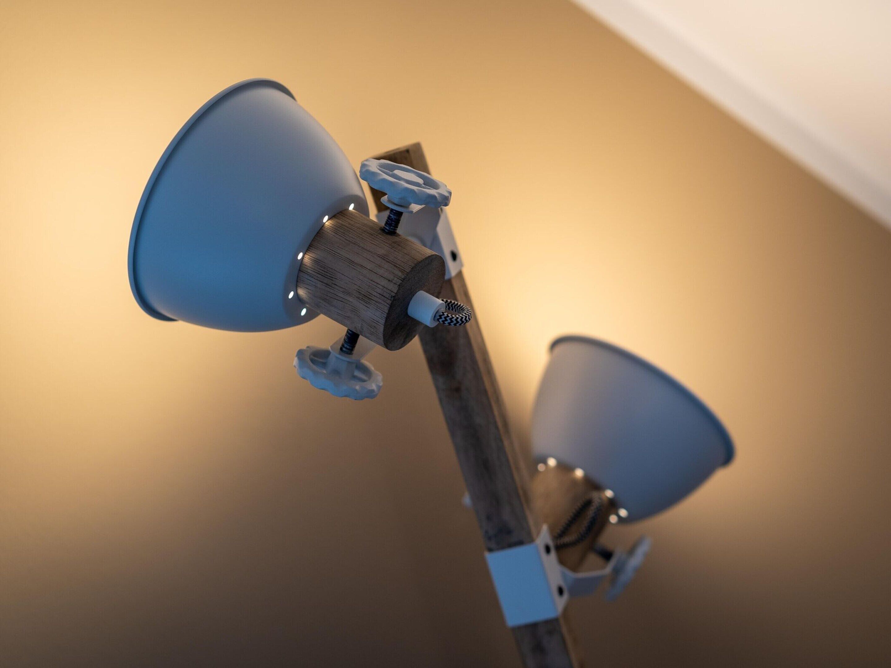 Un ventilateur de plafond à trois pales et doté d’un luminaire central.