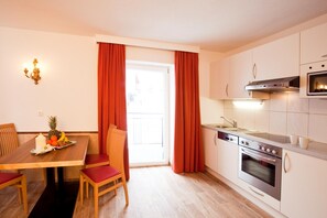 Apartamento | Cozinha privada | Cadeirão de bebê