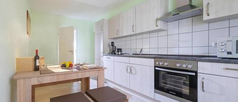 Apartment | Private kitchen | Electric kettle, toaster, highchair