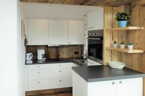 Apartment | Private kitchen | Electric kettle, toaster, highchair