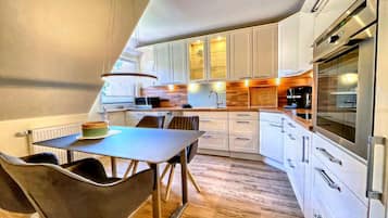 Apartamento | Cozinha privada | Cadeirão de bebê