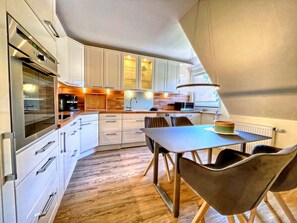 Apartamento | Cozinha privada | Cadeirão de bebê