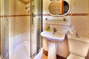 A bathroom with a glass-enclosed shower, a white sink, and a toilet. - Holiday House Near the Sea, Swimming Pool, Mielno (Mielno)