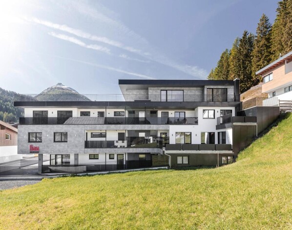 Experience the serene surroundings and expansive views from the hotel's balconies.