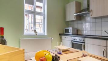 Apartment | Private kitchen | Electric kettle, toaster, high chair