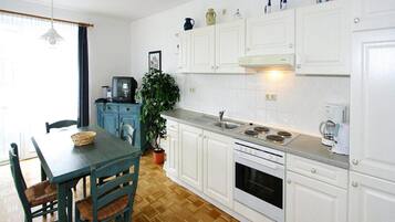 Apartment | Private kitchen | Electric kettle, toaster, high chair