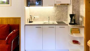 Apartamento | Cozinha privada | Cadeirão de bebê