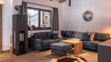 Ferienhaus | Wohnbereich | Kamin