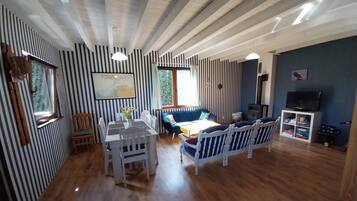 Ferienhaus | Wohnzimmer | Kamin
