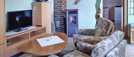 Ferienhaus | Wohnzimmer | Kamin