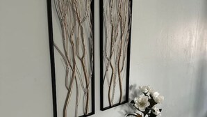 A hallway with a marble console table, a bowl, and two framed abstract artworks on the wall. - Lakewood Gem: Furnished Haven! Perfect for Month Long Stays! (Lakewood)