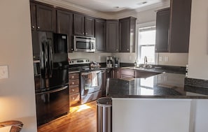 Fridge, microwave, oven, stovetop - Urban Escape - Downtown Raleigh! (Raleigh)