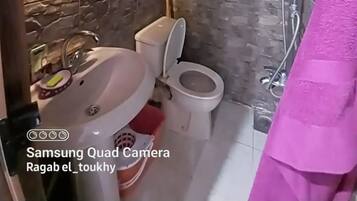 Shower, towels, soap, shampoo