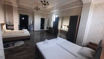 Family Studio Suite, Balcony, City View | Soundproofing, free WiFi