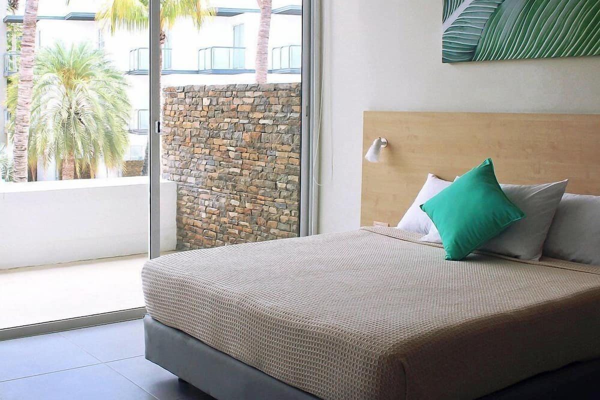 Family Room | 1 bedroom, down comforters, iron/ironing board, free WiFi