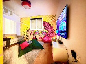 Smart TV, fireplace, video games, table football