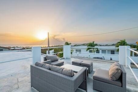 Terrace/patio. Casa Mariposa - Hilltop home with Pool and Rooftop