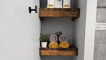 Hair dryer, towels, soap, toilet paper