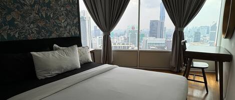 2 عدّة غرف نوم ومكواة/لوح كي وواي فاي وملاءات أسرّة