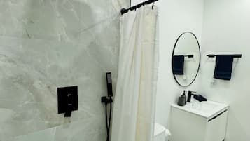 Hair dryer, towels, soap, shampoo