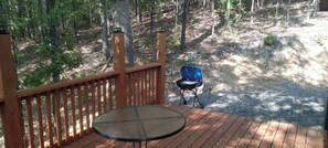 Property grounds - HICKORY HIDEOUT
The cabin is surrounded by a large area of trees for privacy (Mena)