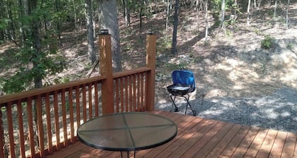 HICKORY HIDEOUT
The cabin is surrounded by a large area of trees for privacy