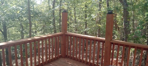 HICKORY HIDEOUT
The cabin is surrounded by a large area of trees for privacy