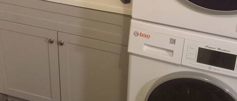 Hair dryer, towels, soap, shampoo