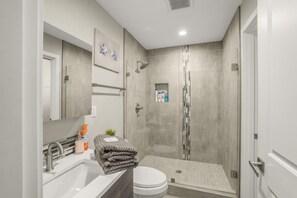 Shower, hair dryer, towels, soap