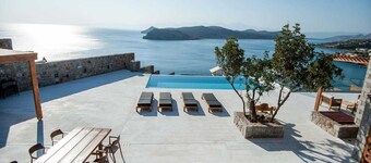 Magnificent Crete Villa | Villa Iris | 6 Bedrooms | Direct Access to Beach | Private Infinity Pool with Breathtaking Sea Views | Outdoor Lounge & Dining Area & BBQ | Fitness Area & Playroom | Elounda