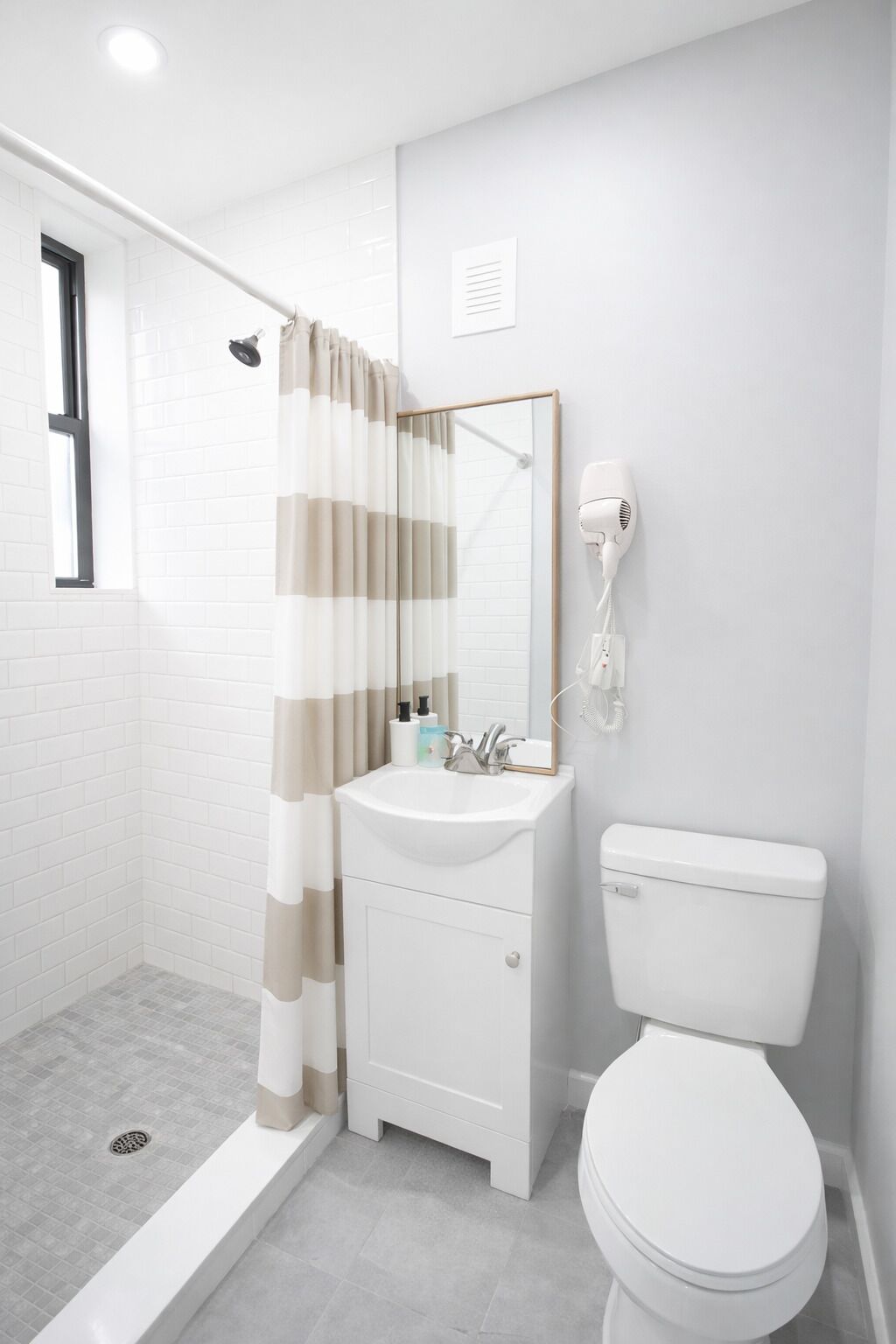 Hair dryer, towels, soap, toilet paper
