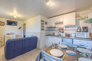 Fridge, microwave, coffee/tea maker, toaster