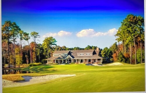 New 3-bedroom  townhome near  OBX beaches with a community pool . Outside lounge