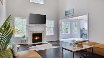 Smart TV, fireplace, foosball, table tennis