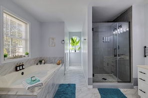 Jetted tub, hair dryer, towels, soap