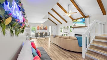 Smart TV, fireplace, table football, books