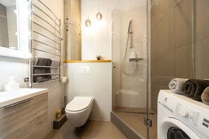 Shower, eco-friendly toiletries, hair dryer, bidet