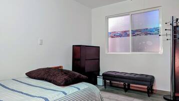 2 dormitorios, escritorio, tabla de planchar con plancha y wifi gratis